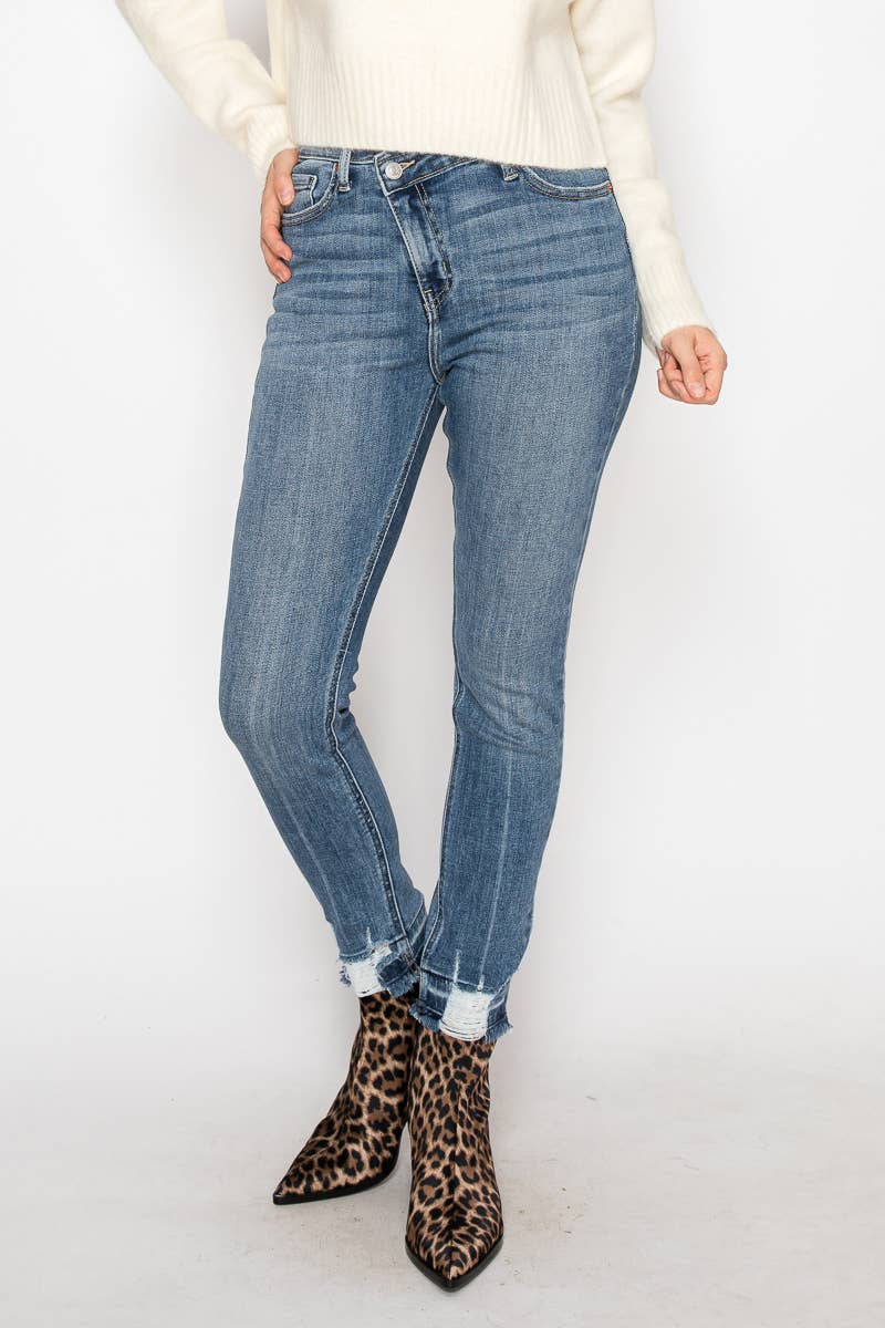 HIGH RISE CROSSOVER SKINNY JEANS