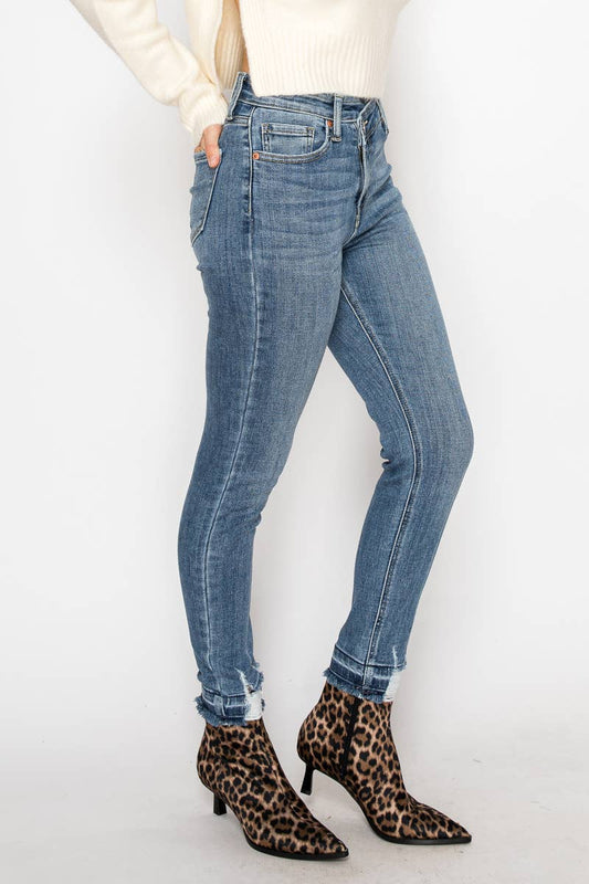 HIGH RISE CROSSOVER SKINNY JEANS